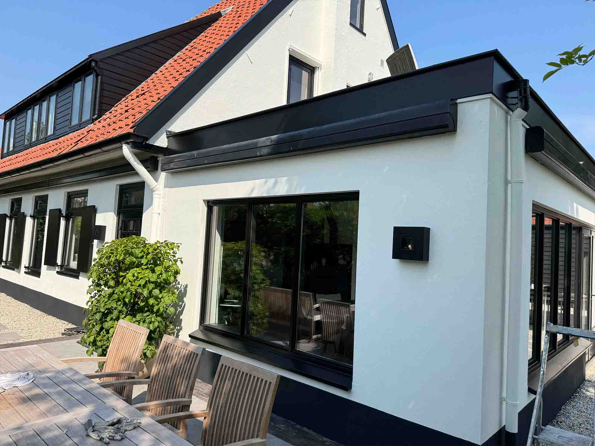 Gevel gespoten en buitenschilderwerk woonhuis in Breukeleveen